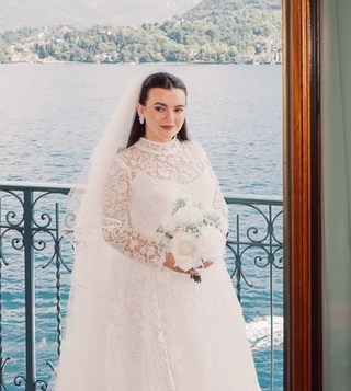 Bride wearing the Nice Cream London Hydrangea Pearl Earrings on her wedding day.