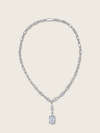 Bridget necklace in premium white gold with oval cut cubic zirconia stones on neutral background