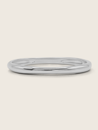 Christy bangle made from sterling silver and finished with premium White Gold plating, sleek oval design