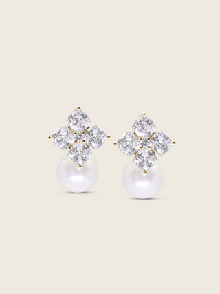 The Crystal Hydrangea Earrings with Shell Pearl featuring intricately cut CZ petals and a luminous shell pearl drop, crafted in sterling silver with gold plating, displayed on a clean white background.