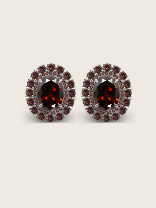 Diana earrings in premium white gold with deep wine coloured oval centre stone and halo of cubic zirconia
