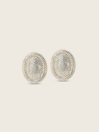 Gold plated Gigi pavé oval stud earrings fully encrusted with clear CZ stones, shown on white background. Bold statement earrings with all-over sparkle.