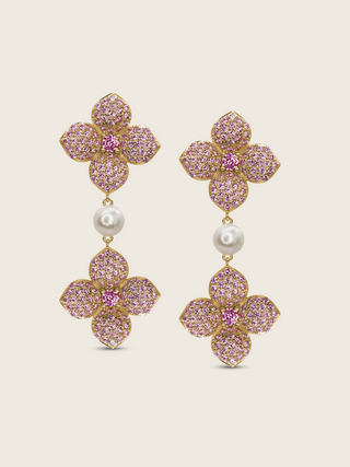 Gold plated hydrangea drop earrings with light pink cubic zirconia petals and a freshwater pearl centre, feminine floral design perfect for soft occasion styling