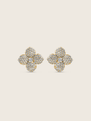 Gold plated flower stud earrings with pavé clear stones in a four-petal hydrangea design, shown on a neutral background
