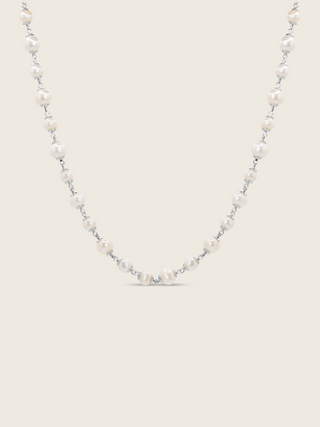 White Gold-plated Margot necklace featuring alternating freshwater pearls on fine chain, displayed on white background
