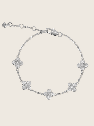 White gold chain bracelet with five crystal pavé hydrangea flower charms, delicate and adjustable design