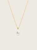 14k gold plated Audrey necklace, with a freshwater pearl and fine gold chain displayed on a neutral background