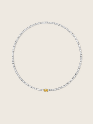 aurelia necklace white gold plated with central yellow oval stone, on a neutral background