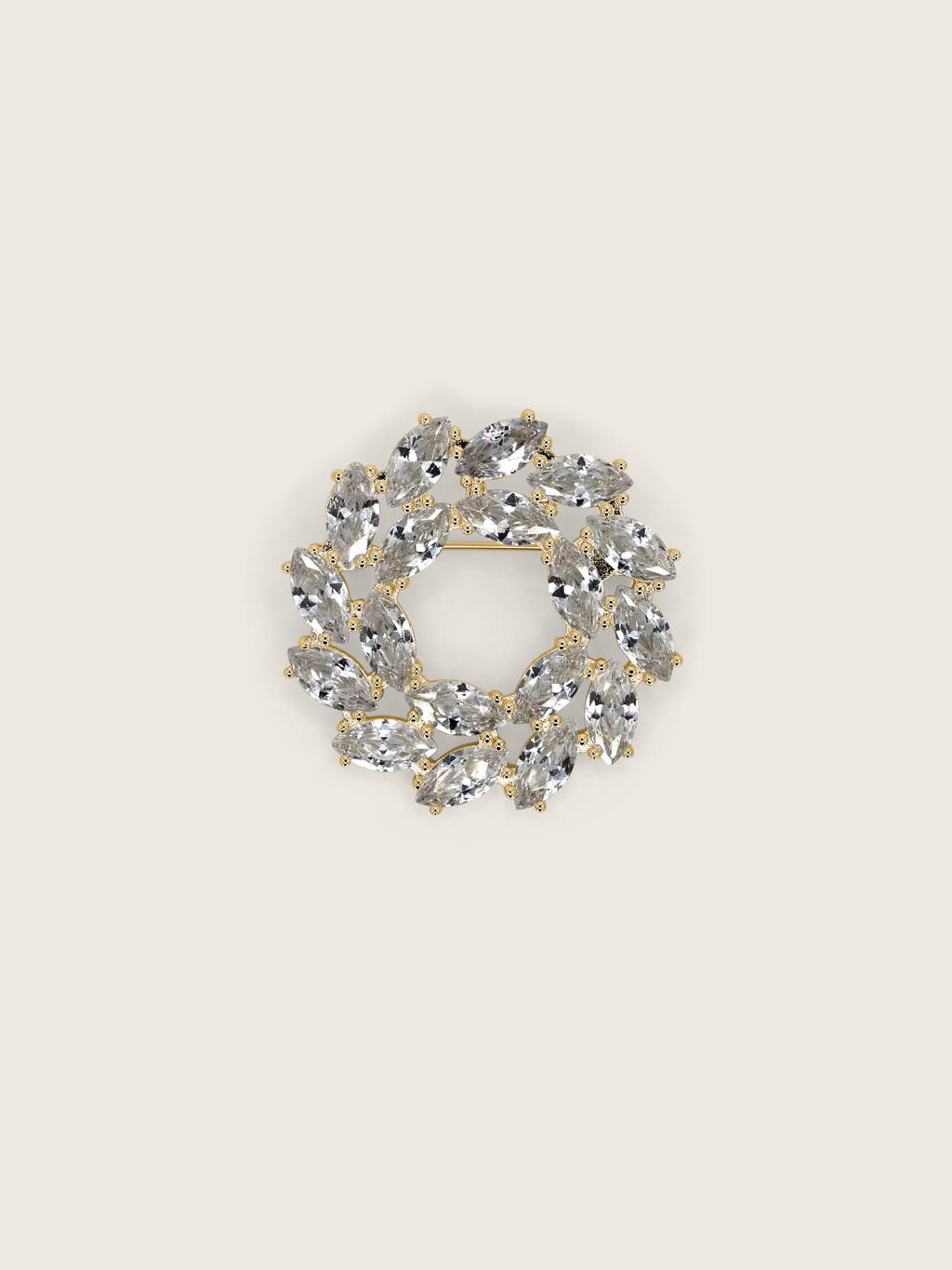 Amanda Brooch in 14k gold plating with clear crystal marquise cut cubic zirconia stones in wreath design, displayed on neutral background