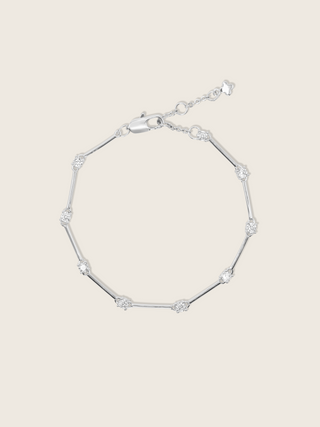 Astra Bracelet in premium white gold plating with bar and cubic zirconia stone links, adjustable chain clasp dainty bracelet