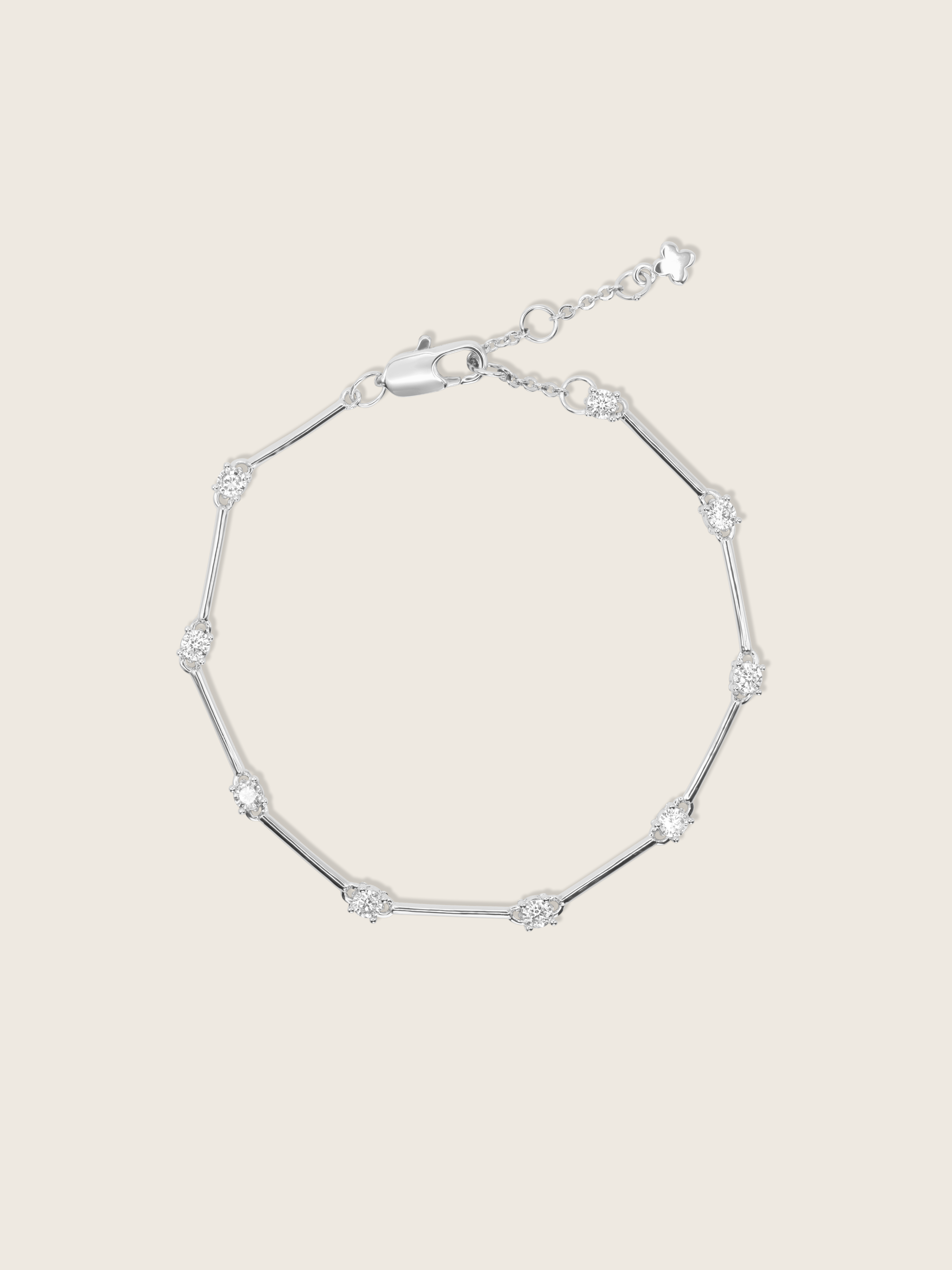 Astra Bracelet in premium white gold plating with bar and cubic zirconia stone links, adjustable chain clasp dainty bracelet