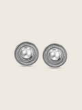 Athena stud earrings in sterling silver with white gold plating, featuring a concentric circle design and raised domed centre, retro-inspired mid-century style jewellery photographed on a white background.