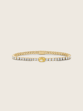 Gold plated Aurelia lemon drop bracelet with yellow oval centre stone and clear CZ for a vibrant, elegant finish