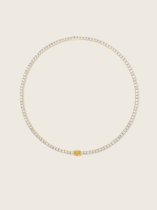 Gold plated tennis necklace with clear CZ stones and a lemon yellow oval centre stone for a radiant statement look