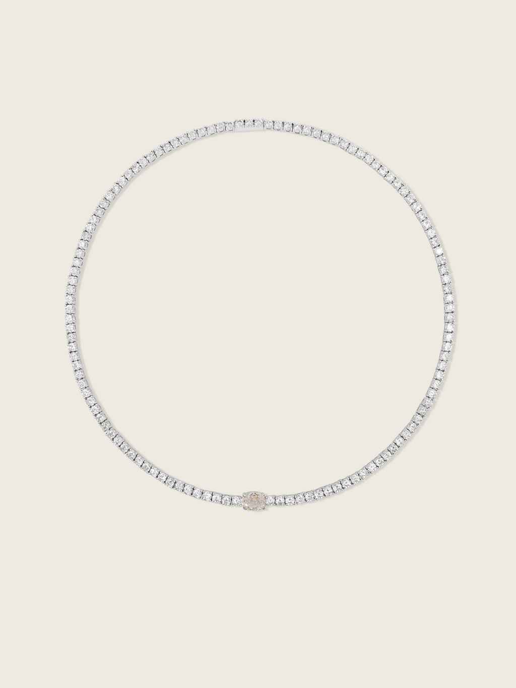 White gold plated tennis necklace with clear CZ stones and central oval-cut detail
