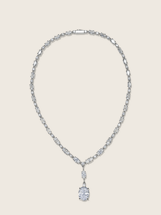 Bridget necklace in premium white gold with oval cut cubic zirconia stones on neutral background