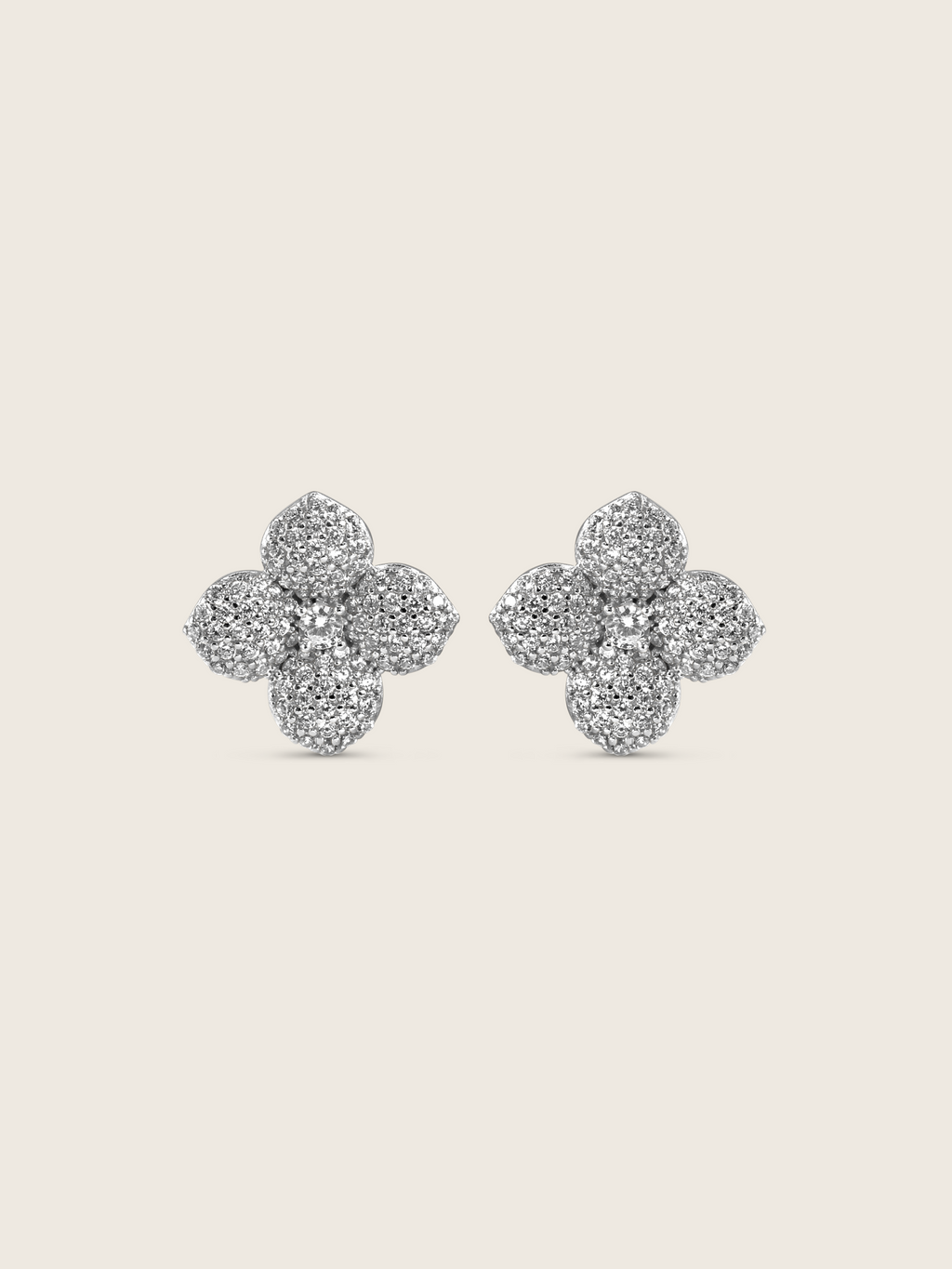 Classic Hydrangea stud earrings in sterling silver with white gold plating, featuring a bold floral design with clear cubic zirconia stones on each petal and a prominent centre stone, elegant statement studs displayed on a white background.