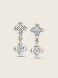 The Double Crystal Drop Hydrangea Earrings featuring two sparkling CZ stones linked by a delicate connecting stone, set in sterling silver with gold plating, displayed on a clean white background.