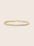 Estelle tennis bracelet in 14k gold plating with cubic zirconia stones, classic S-link design