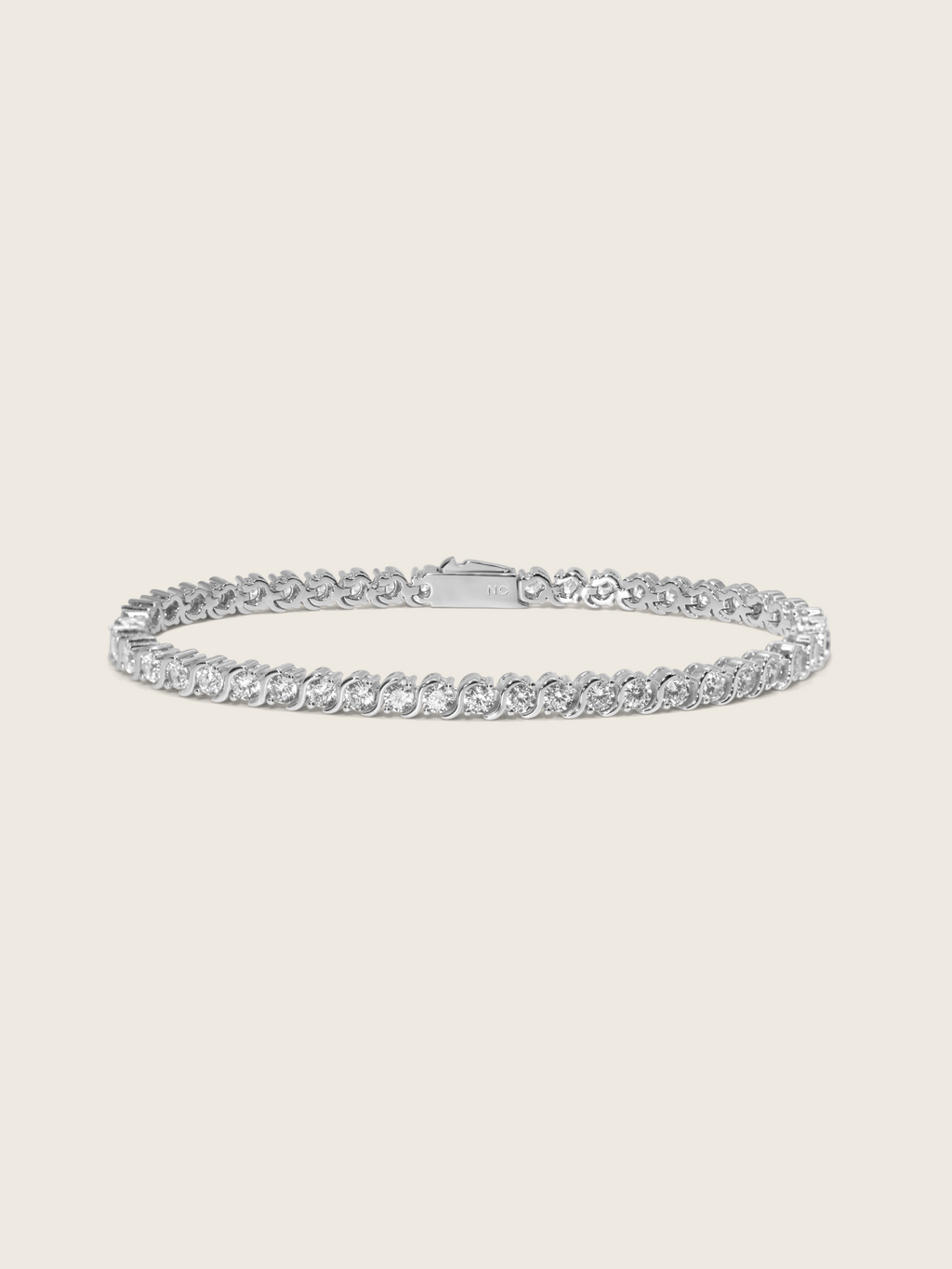 Estelle tennis bracelet premium white gold plated brass with cubic zirconia stones in S link wave setting
