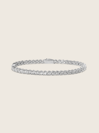 Estelle tennis bracelet premium white gold plated brass with cubic zirconia stones in S link wave setting