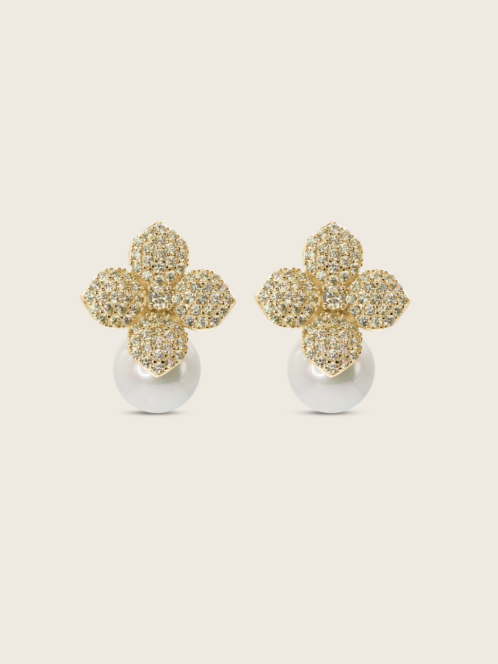 Gold plated Hydrangea earrings with yellow CZ sparkly stones and shell pearl, photographed on a neutral background, perfect for weddings and other formal occasions
