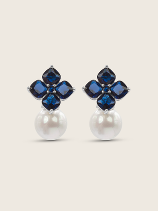 White gold plated hydrangea earrings with translucent deep blue cubic zirconia stones and shell pearls