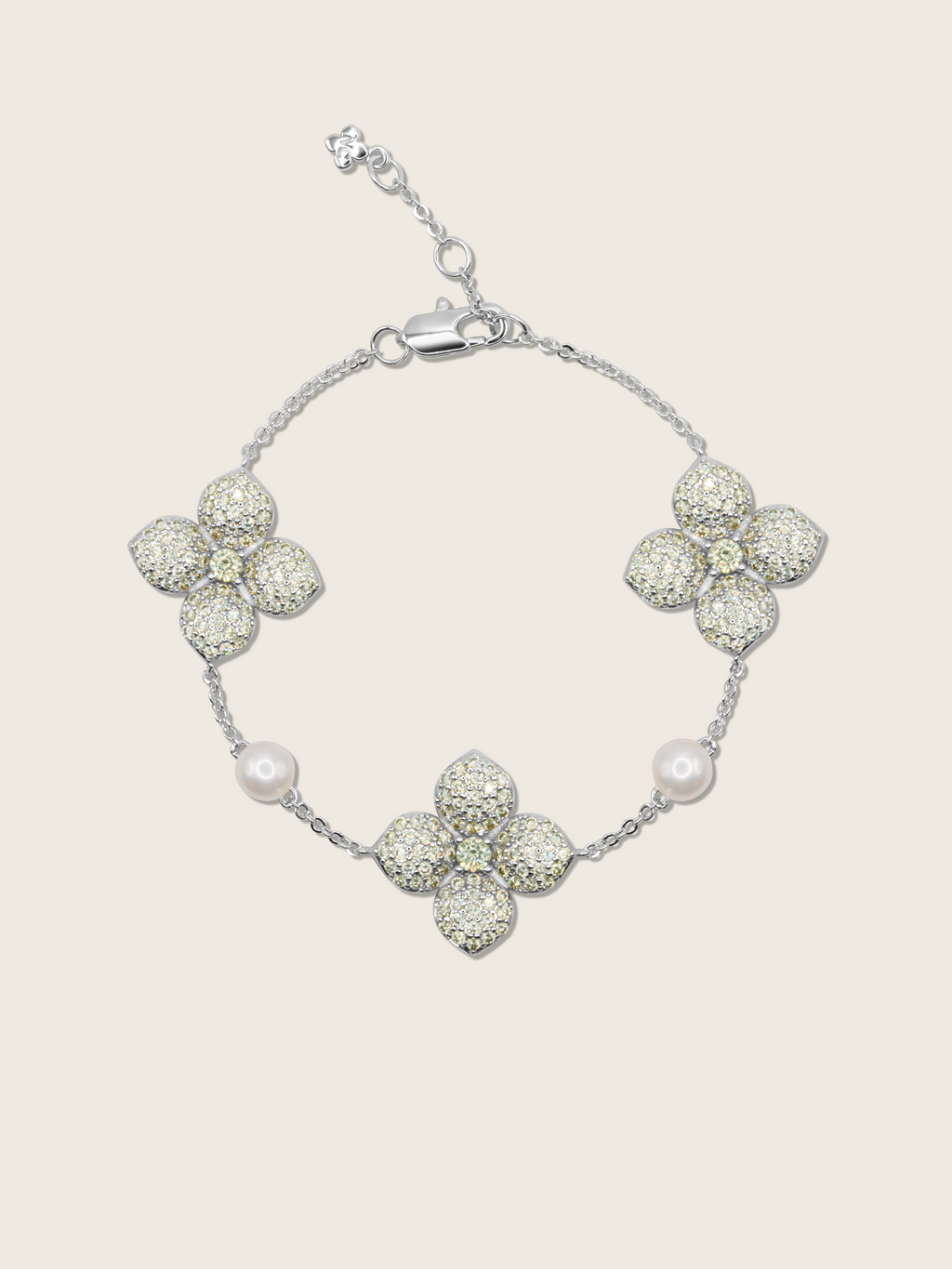 White Gold-plated hydrangea bracelet with lemon yellow CZ stones and freshwater pearls, displayed on plain background