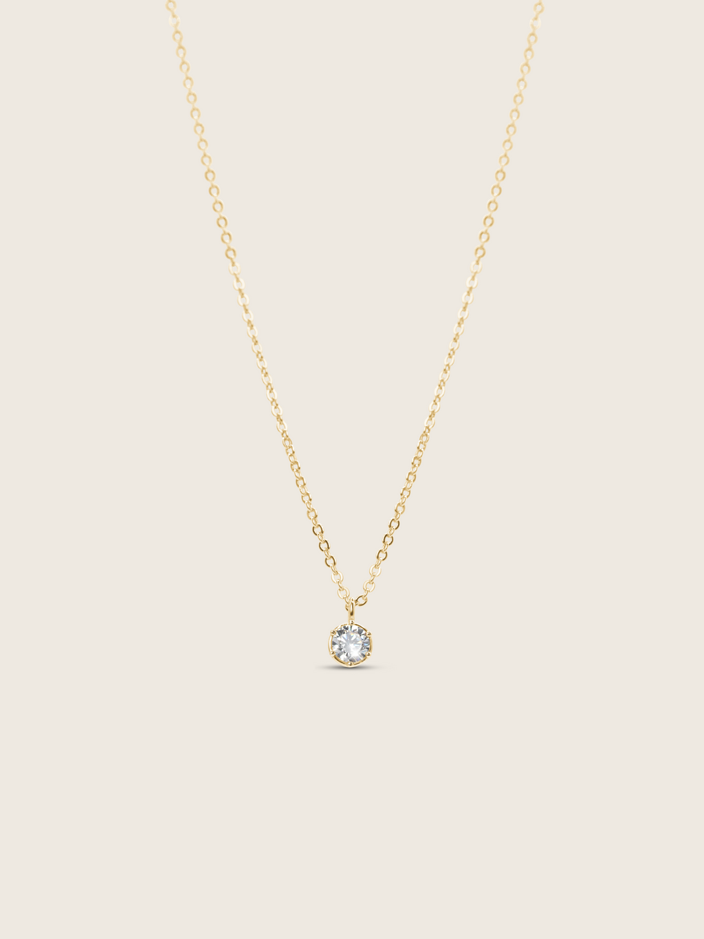 Luna gold pendant necklace with cubic zirconia stone on 14k gold plated brass chain