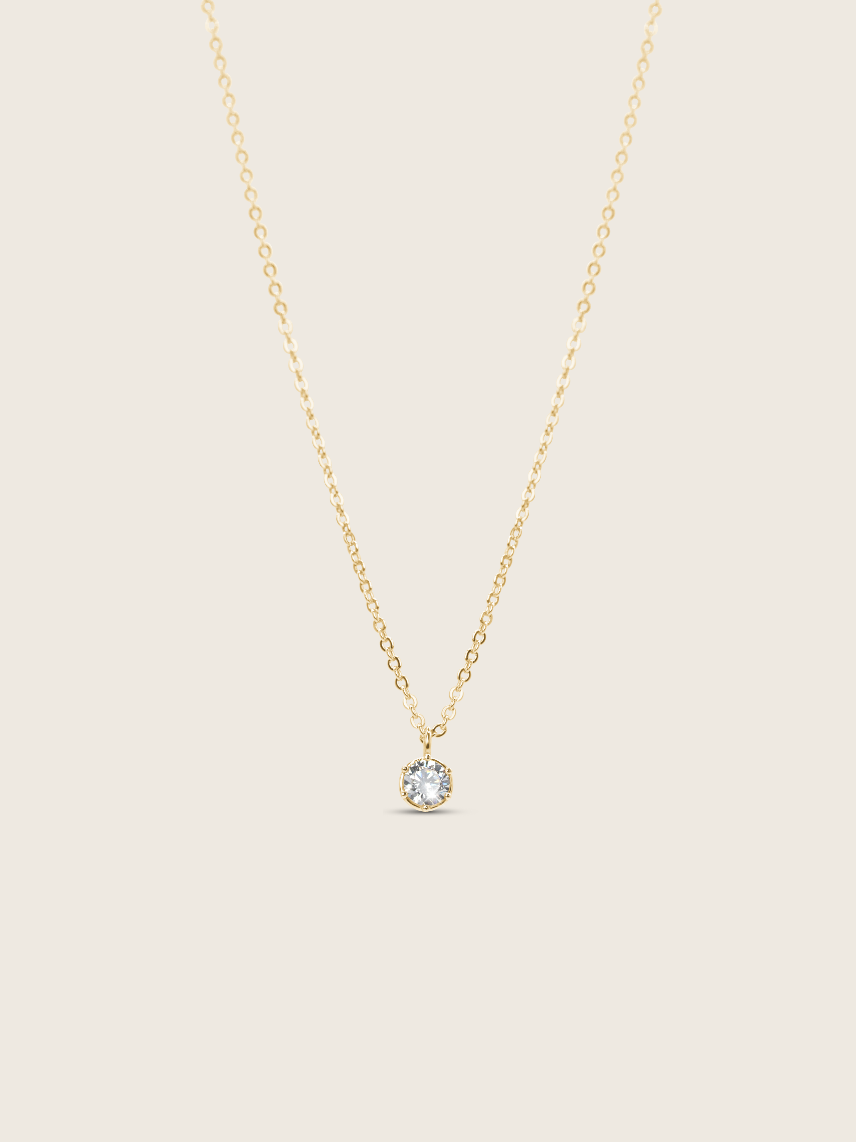 Luna gold pendant necklace with cubic zirconia stone on 14k gold plated brass chain