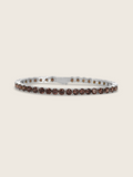 Maria tennis bracelet in premium white gold with wine coloured cubic zirconia stones on neutral background