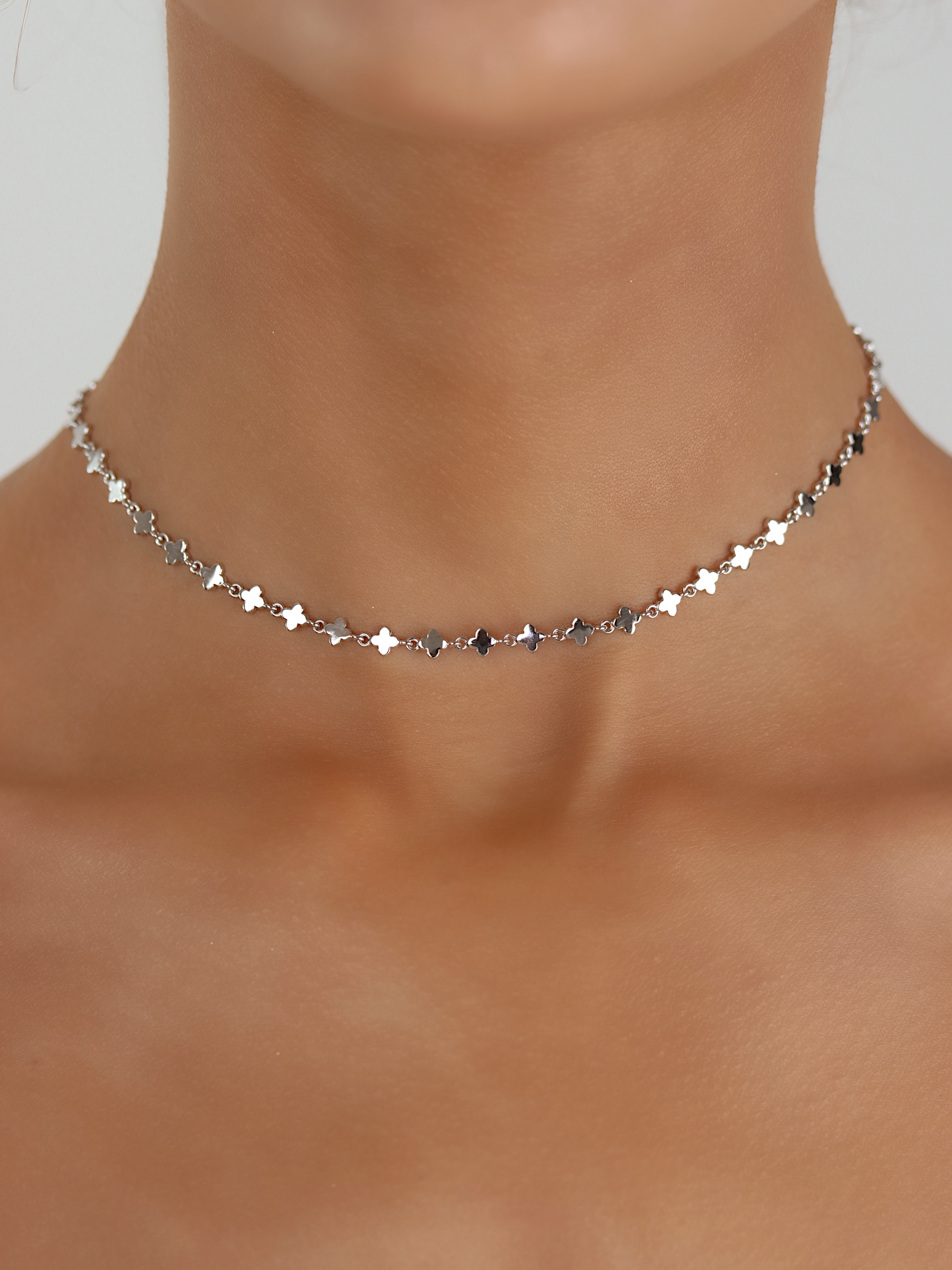 Micro Hydrangea necklace premium white gold plated brass with delicate flower chain links shown on model