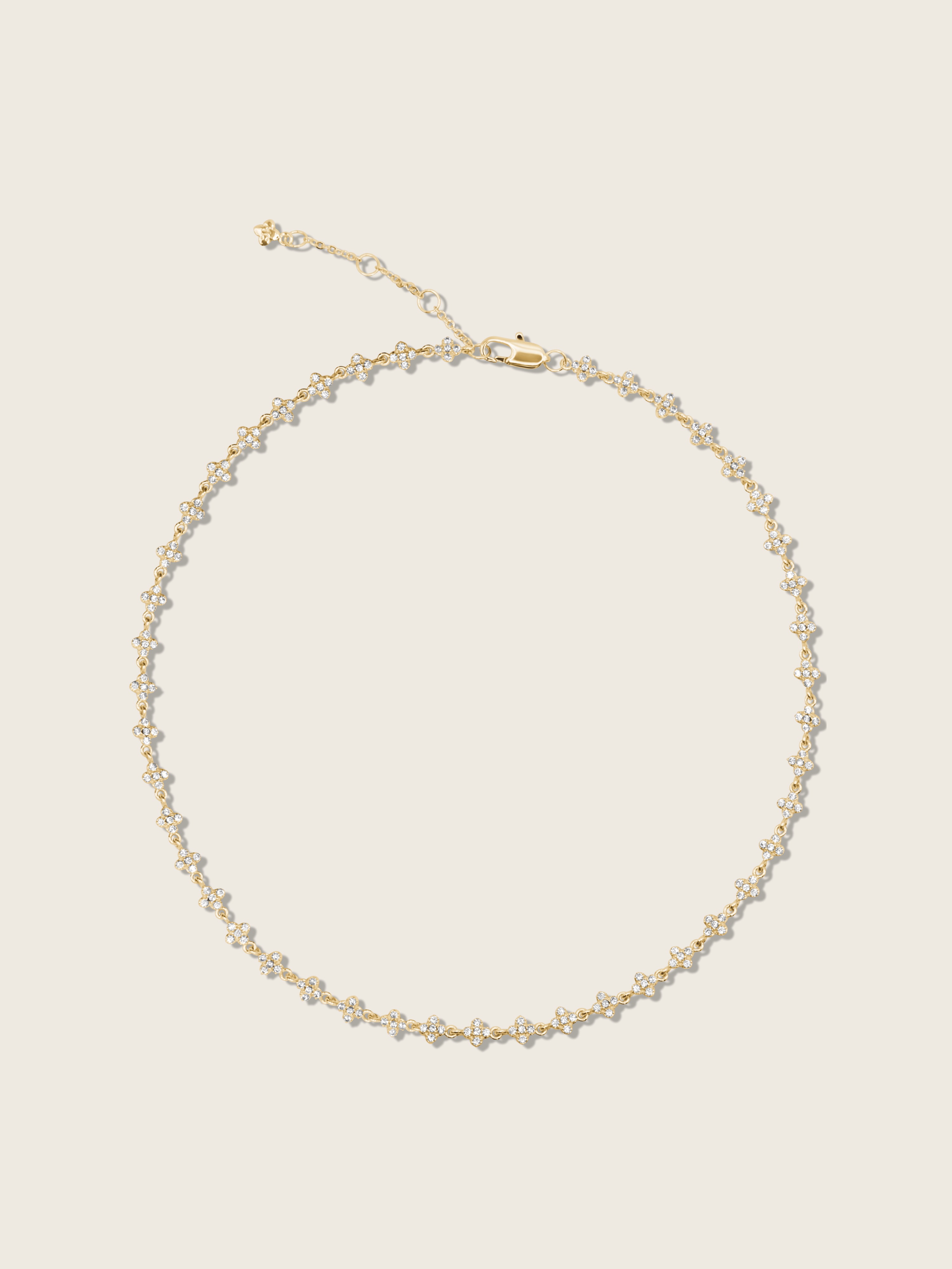 Micro hydrangea pavé necklace in gold, displayed flatly on a white background, showcasing the intricate flower pendant and detailed pavé design.
