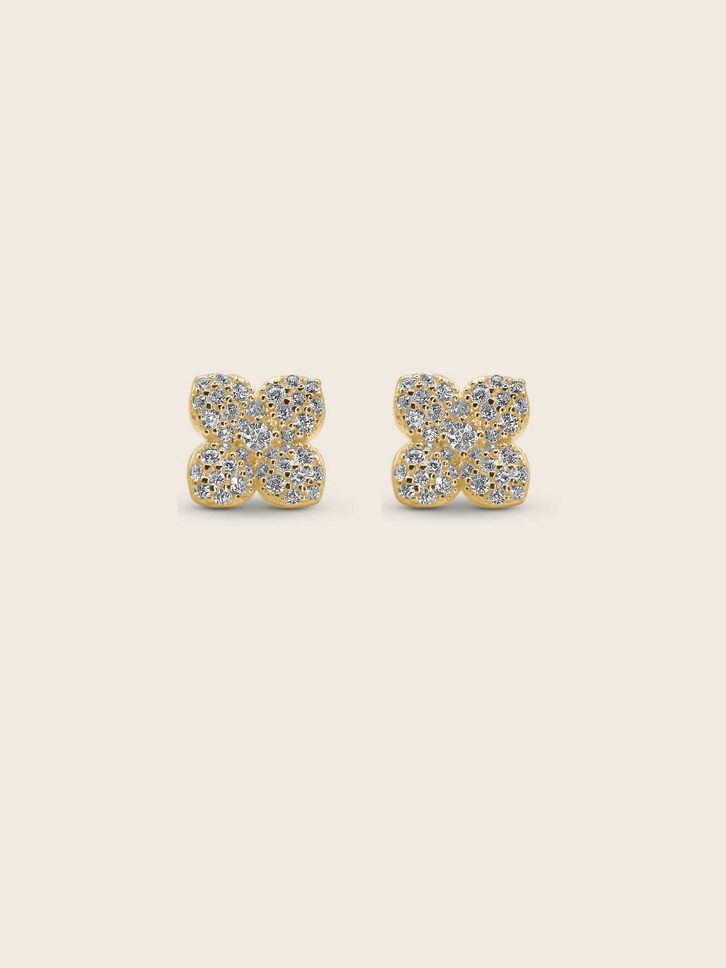 Mini Hydrangea stud earrings in gold plating with four rounded pavé petals and a delicate symmetrical floral design