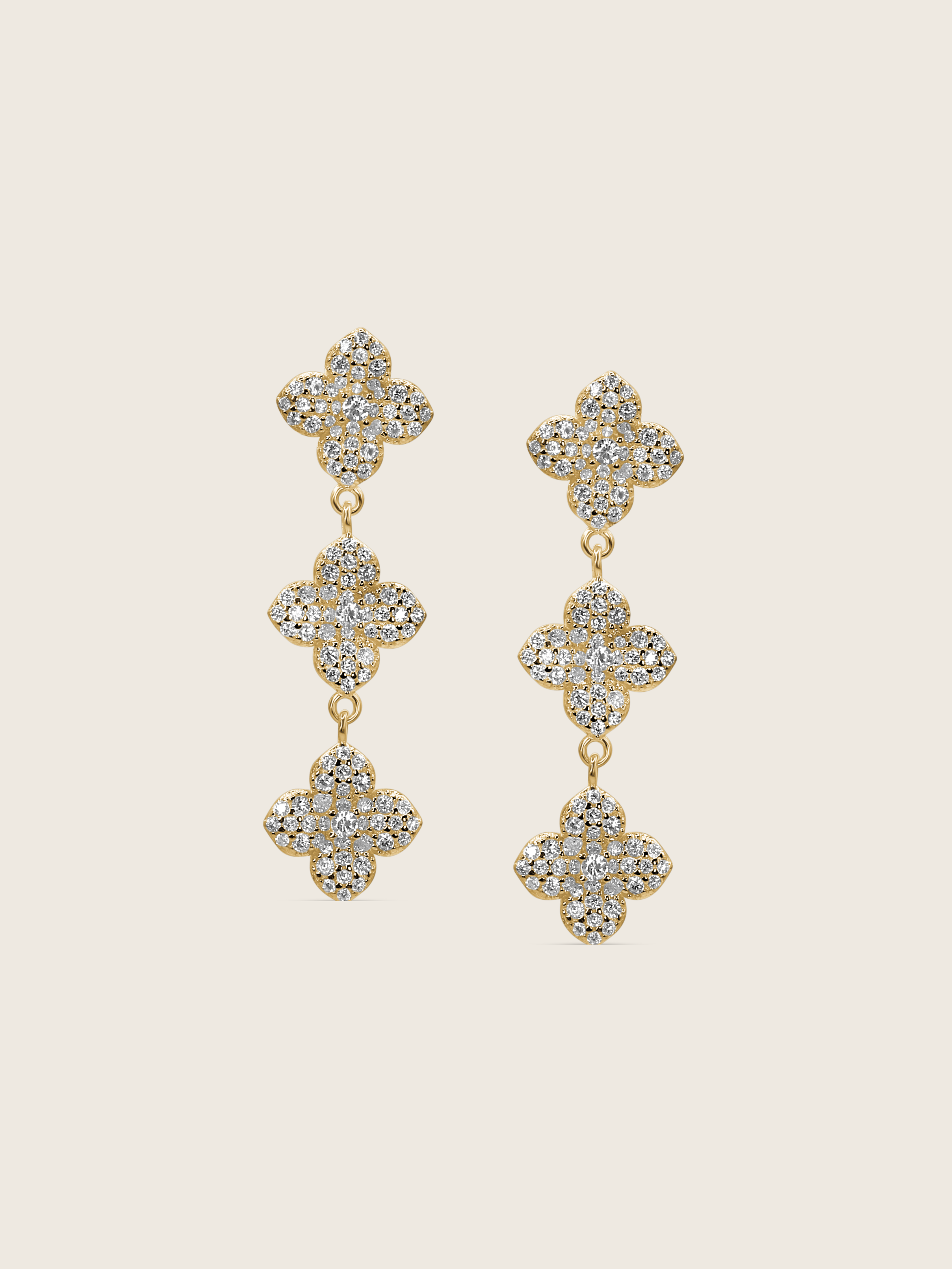 Mini Triple Hydrangea drop earrings in gold plating, featuring three dainty pavé flower motifs linked in a vertical cascade