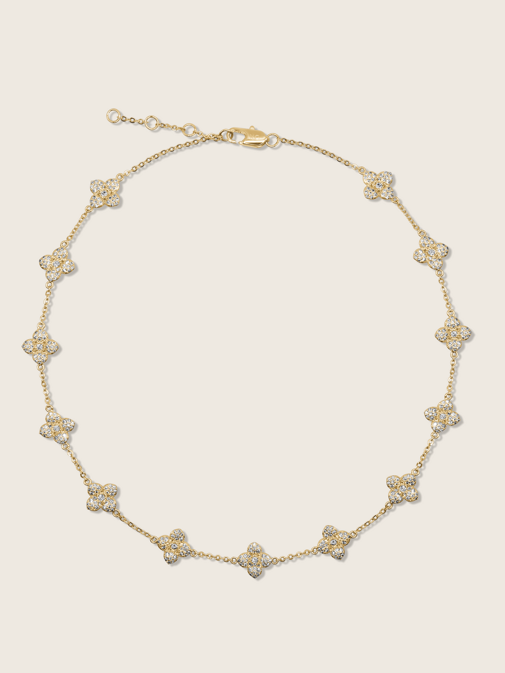 Gold plated Multi Mini Hydrangea necklace featuring a delicate chain with evenly spaced pavé flower charms in a symmetrical design