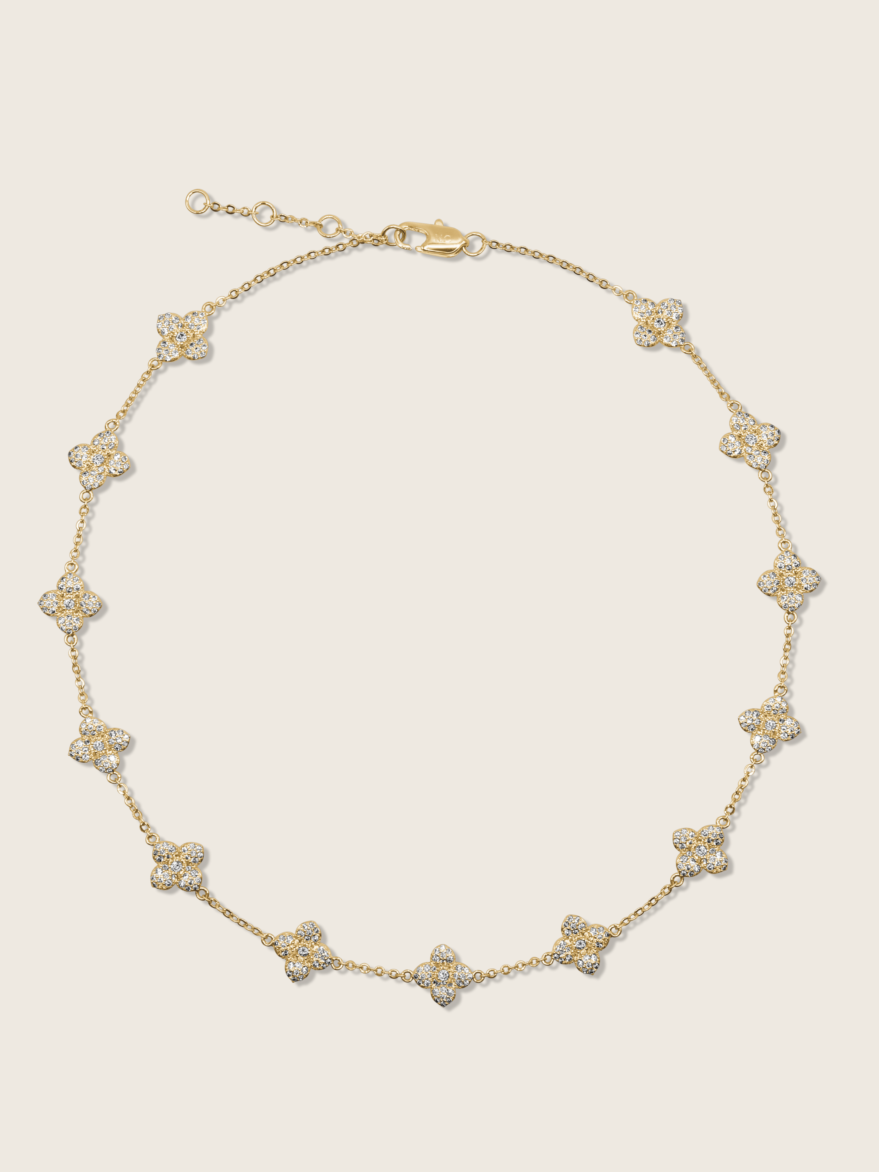Gold plated Multi Mini Hydrangea necklace featuring a delicate chain with evenly spaced pavé flower charms in a symmetrical design