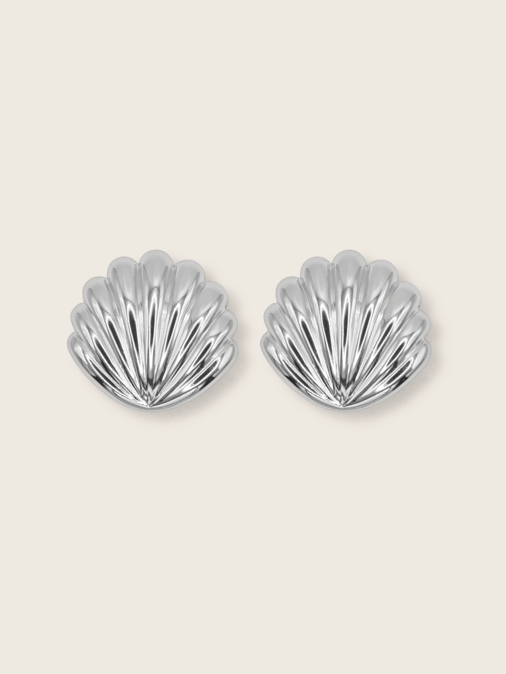 Muriel earrings with sculpted shell design, crafted from sterling silver and finished in premium White Gold plating