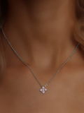 White gold plated mini hydrangea necklace in light pink CZ, worn at the collarbone for a soft, romantic touch - perfect layered or styled solo
