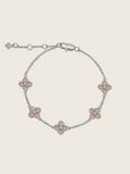 White gold plated bracelet with five light pink cubic zirconia hydrangea charms on fine chain, shown on neutral background