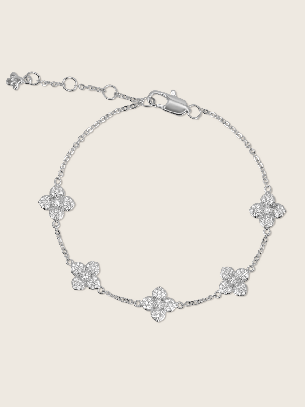 White gold chain bracelet with five crystal pavé hydrangea flower charms, delicate and adjustable design