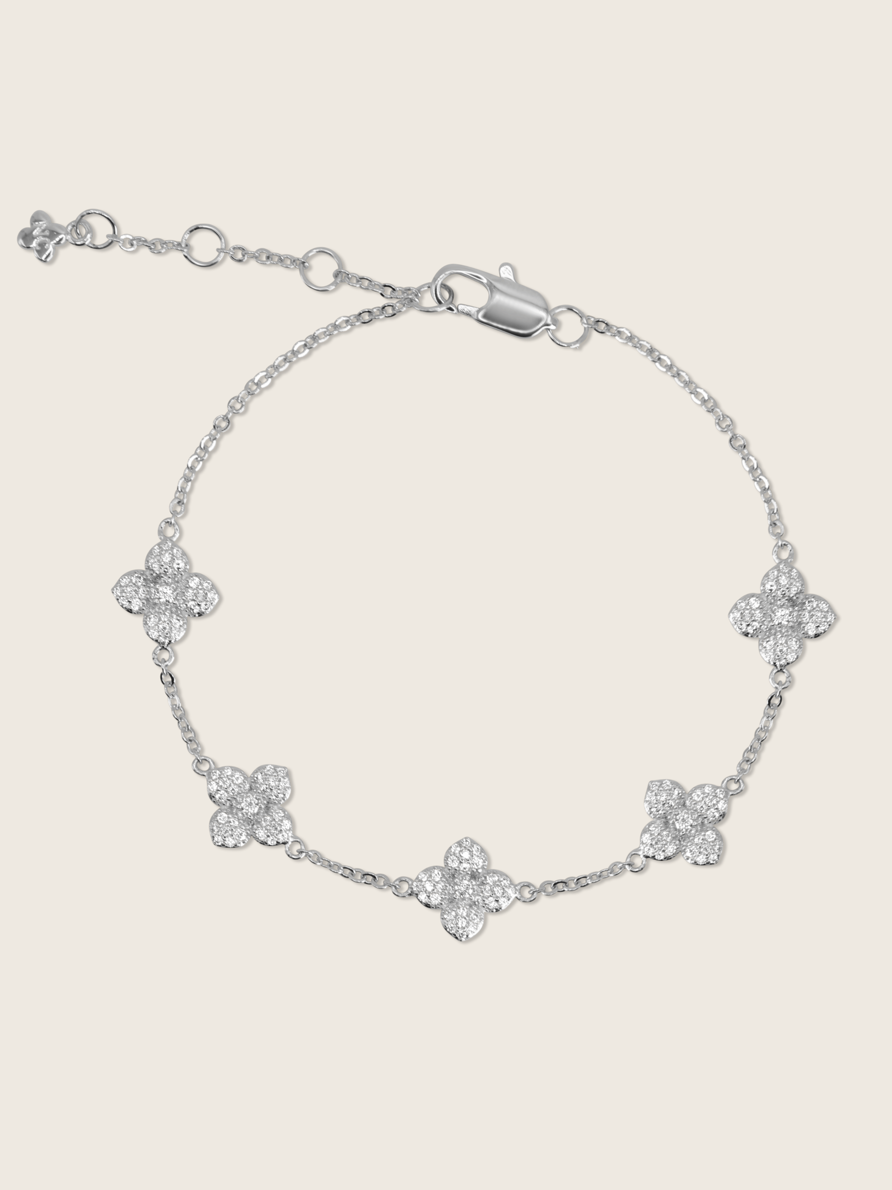 White gold chain bracelet with five crystal pavé hydrangea flower charms, delicate and adjustable design
